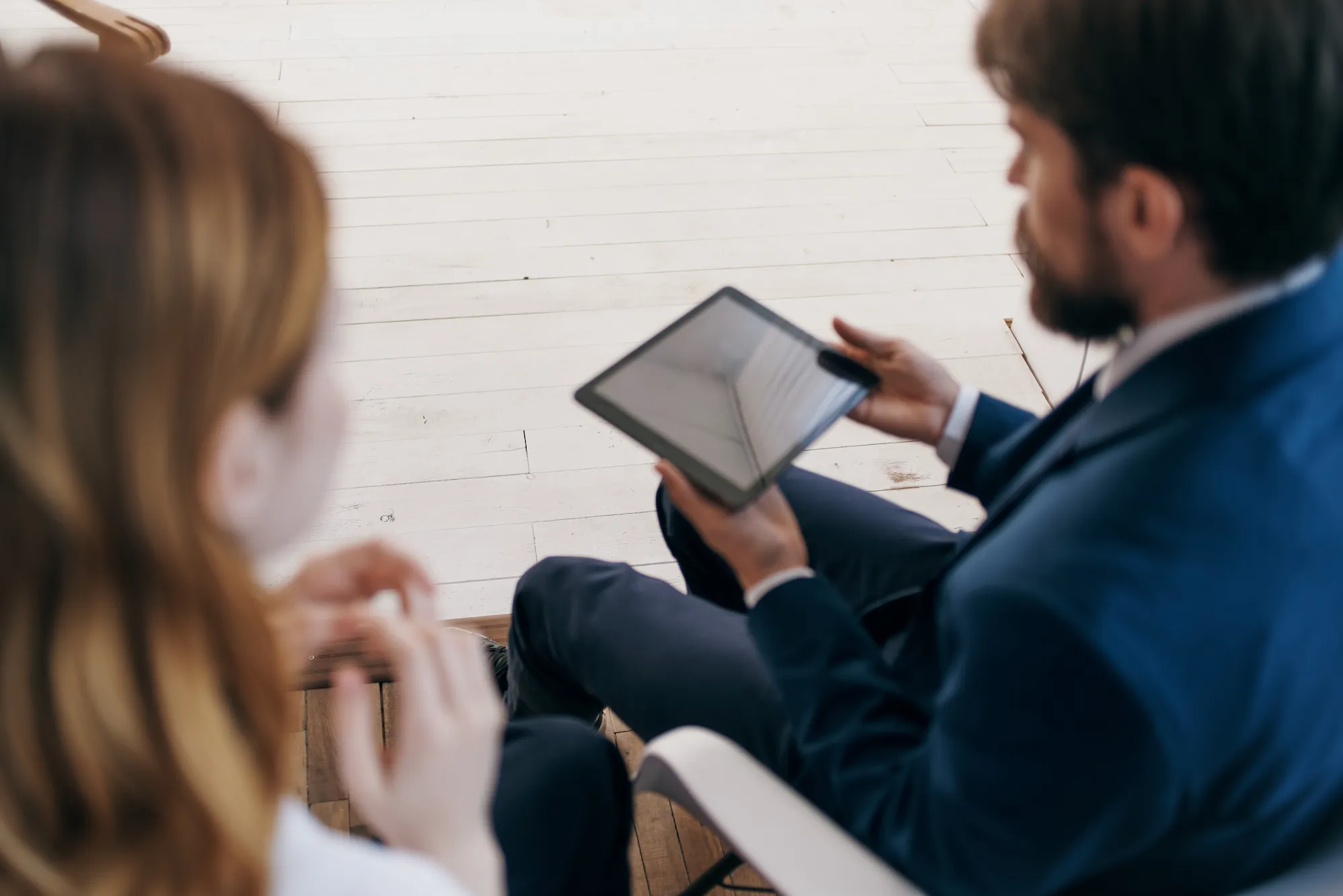 property-manager-tablet-review A property manager reviewing a report on a tablet